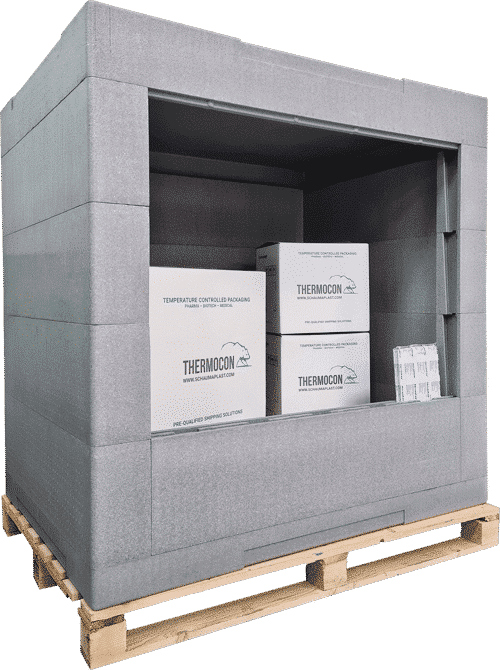 Open insulated pallet shipper containing cartons on a wooden pallet